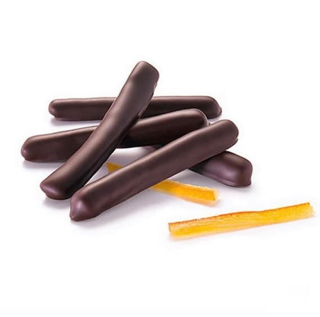 strips of candied orange lay on a white background overlayed with chocolate-dipped candied orange