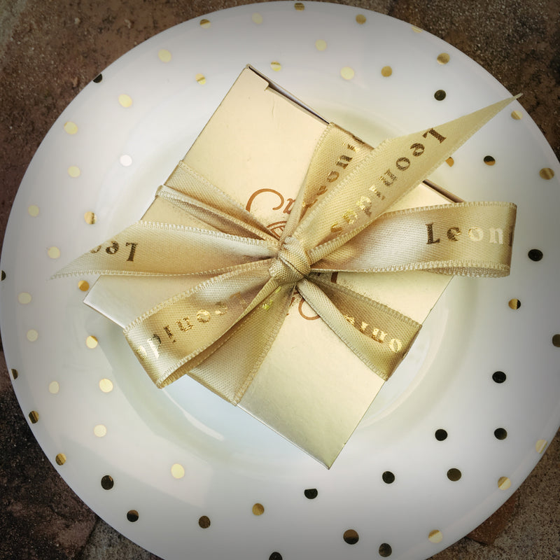 gold leonidas chocolate gift packaging